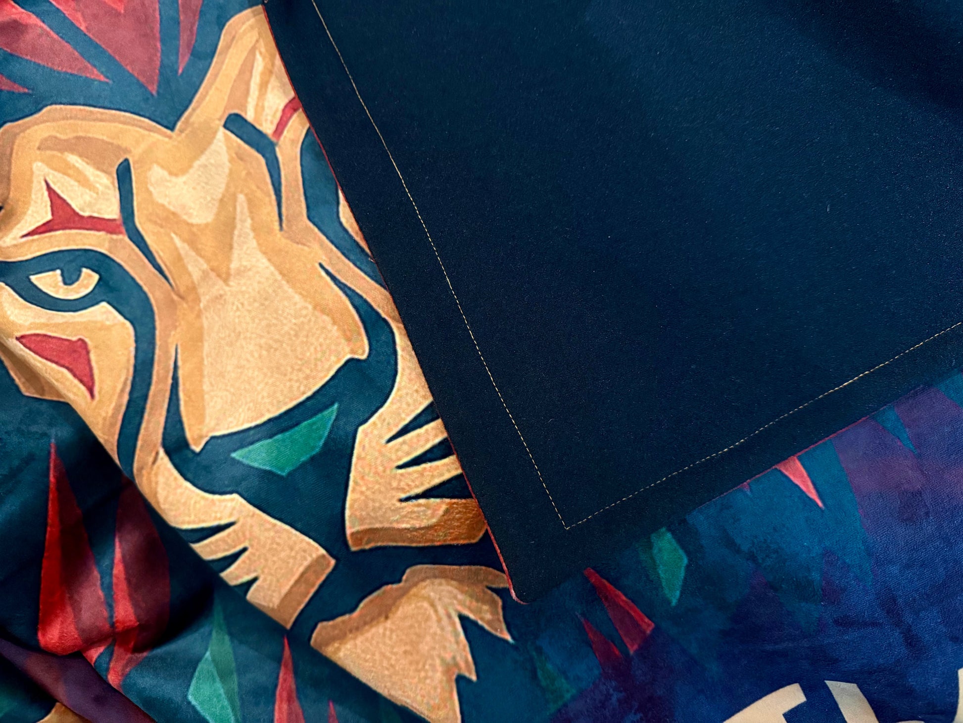 Cape Lion de l’Atlas Édition CAN 2025 RedPride